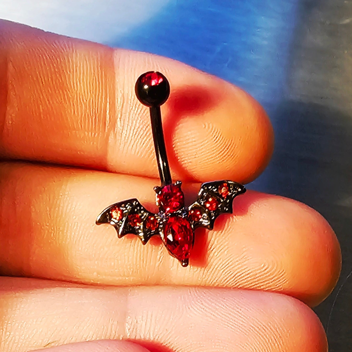 Barre de ventre chauve-souris vampire rouge et noire 14G