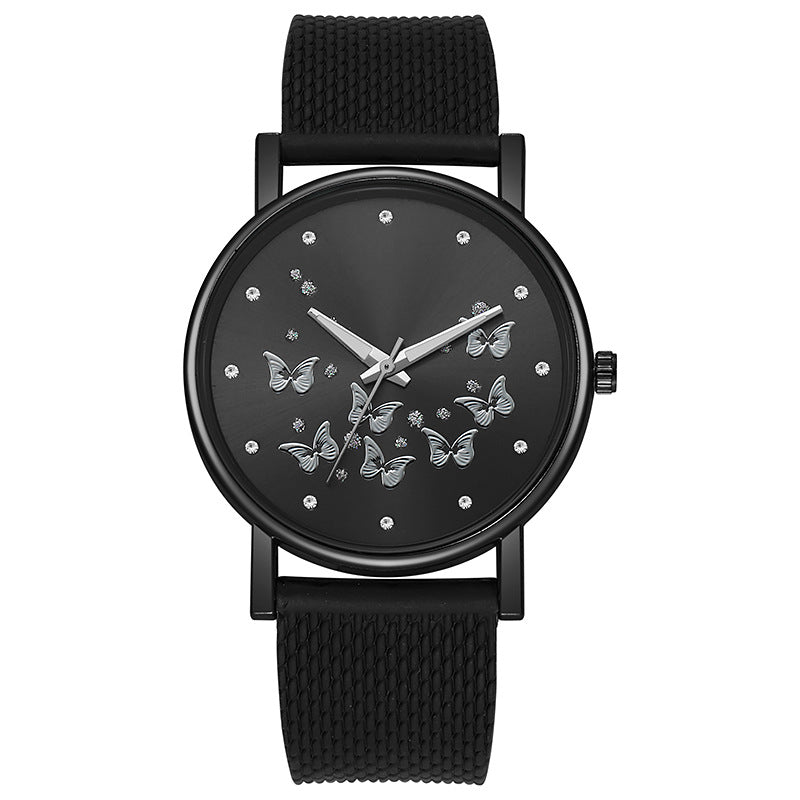 Montre à quartz décontractée pour femme avec boucle de couleur unie et papillon