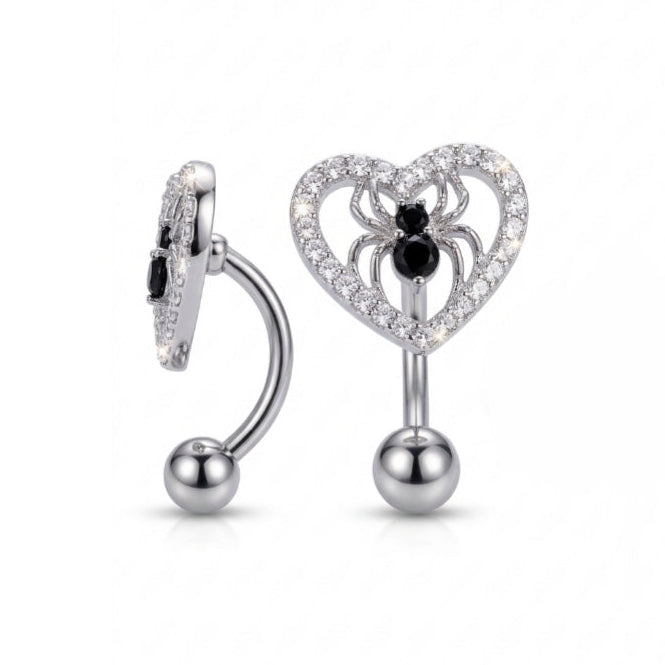 Pave-set clear cubic zirconia heart-shaped reverse navel ring with a detailed black cubic zirconia spider inside, 14g surgical stainless steel bar shown at two angles.