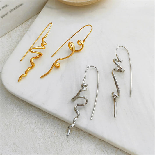 Boucles d'oreilles au design abstrait en trois dimensions