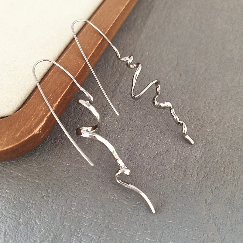 Boucles d'oreilles au design abstrait en trois dimensions