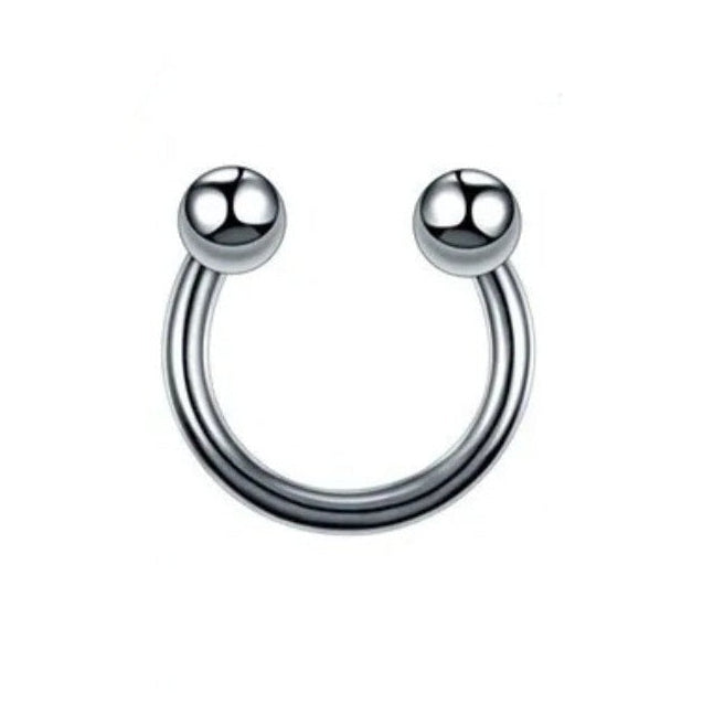A silver titanium steel horseshoe ring piercing