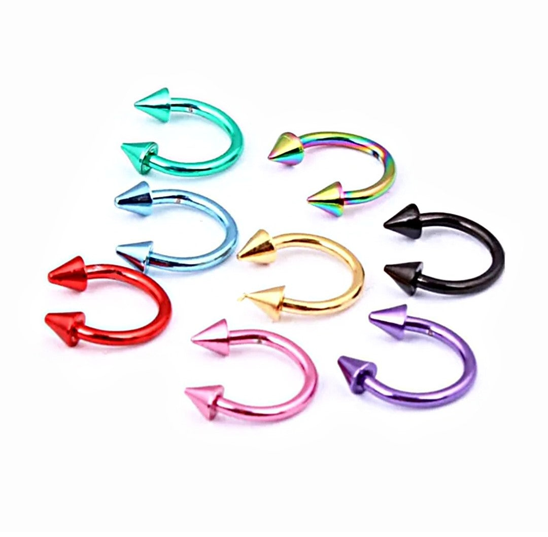8 horseshoe rings of all different colours