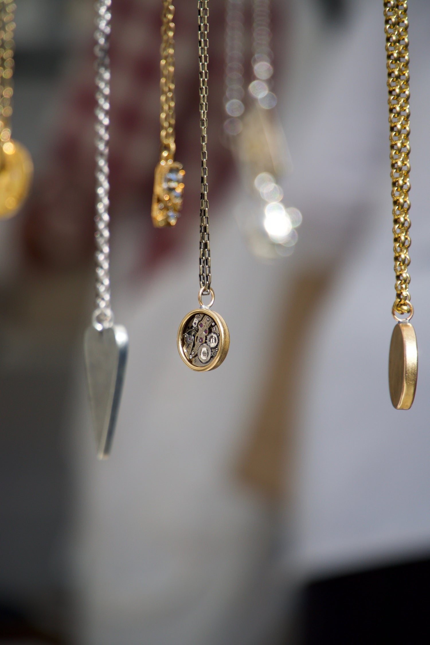 new arrivals dangling necklaces