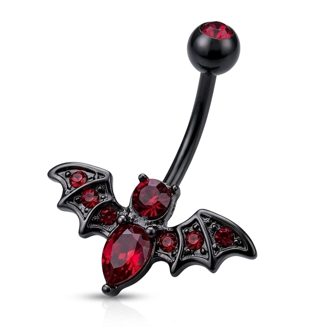 Belly button ring with bat design and red gemstones on a white background